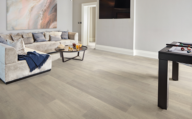 basement flooring with pool table and light luxury vinyl floor